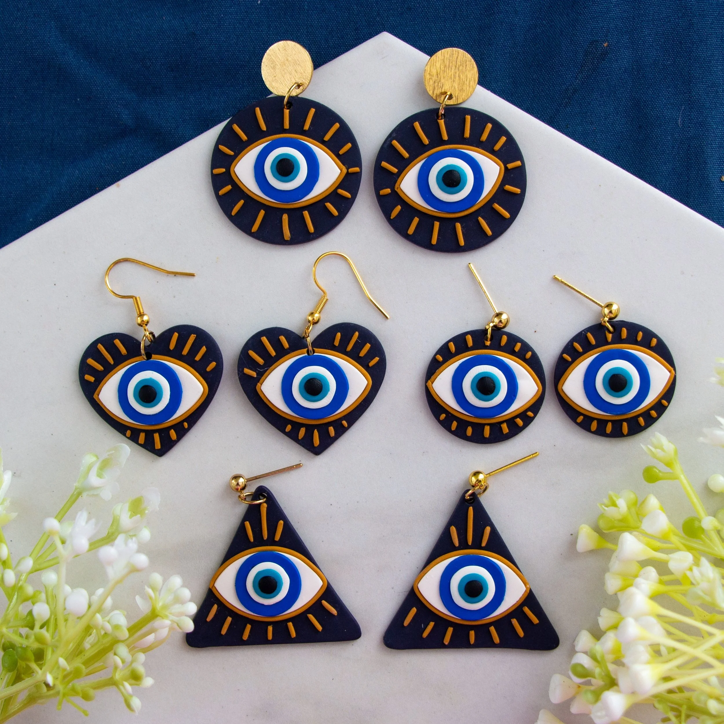 Evil eye clay earrings deals